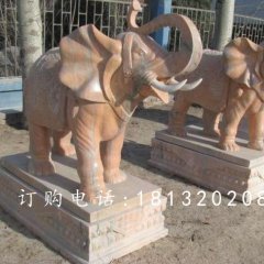 象鼻向上大象石雕，晚霞紅大象雕塑
